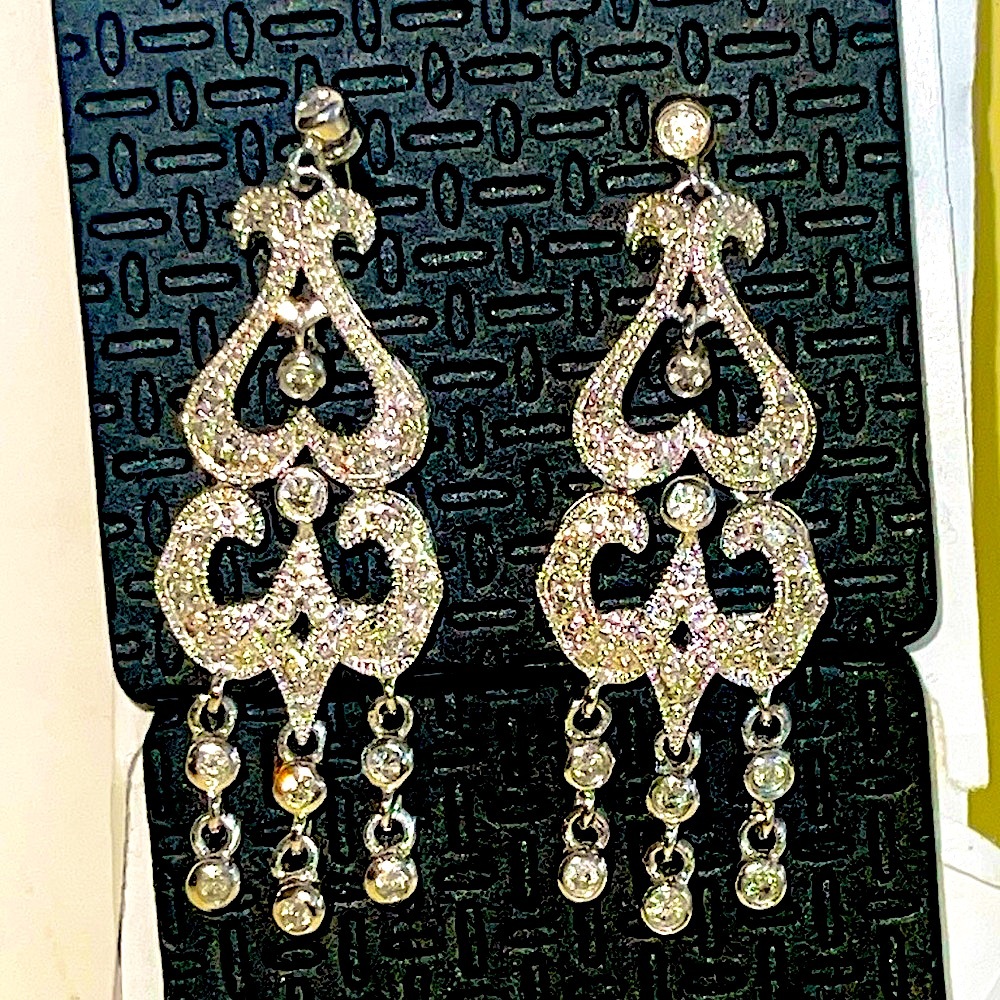 14kt white gold and genuine diamond  earrings, never used.